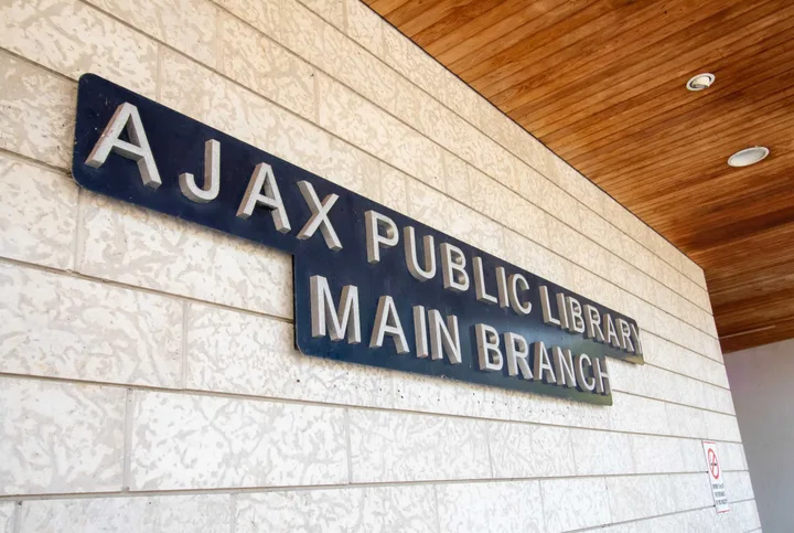 Ajax Public Library Main Branch entrance sign.
