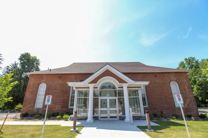 Quaker Meeting House exterior, identified by the Town of Ajax.